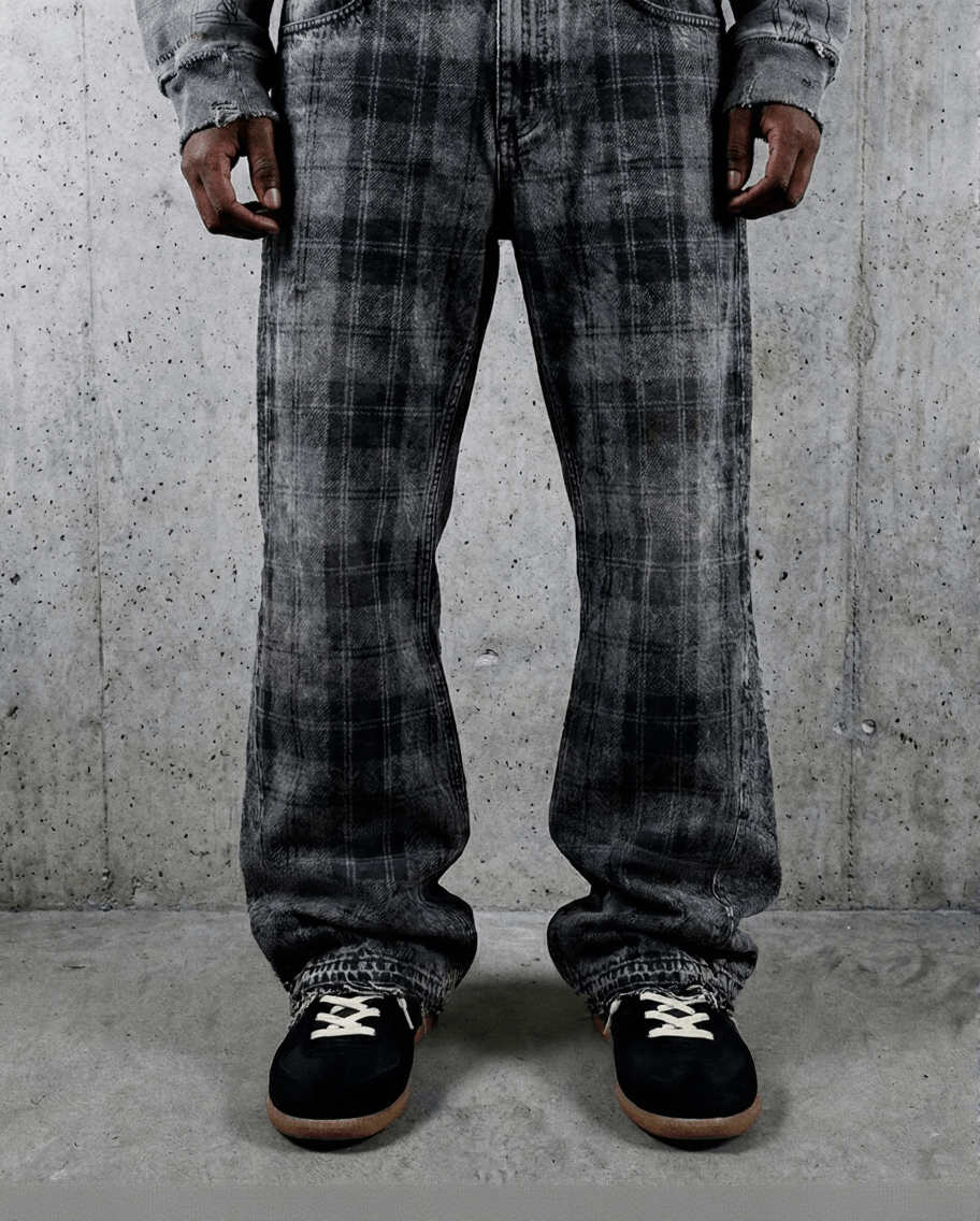 Faded plaid denim featuring a washed black base and subtle plaid pattern underneath.